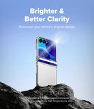 Galaxy Z Flip 8 Case | Fusion Flap - A clear protective case shown on a silver flip-style smartphone, standing upright on a rock against a blue sky background. White text at the top reads 'Brighter & Better Clarity' with smaller copy below.