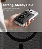 Wallet  | Tech Magnetic - A hand holds a smartphone fitted with a black textured non-slip grip pad on a clear case, with marketing text at the top and a close-up of the pad at the bottom.
