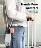 Holder Link Strap | Black - Person wearing a white-speckled lanyard holding a phone case and pink earbud case while traveling.