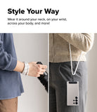 Holder Link Strap | Black - A white rope strap worn around a wrist and as a neck lanyard for a smartphone.