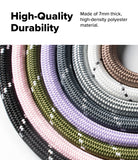 Holder Link Strap | Black - Close-up of several thick, braided polyester rope straps in various colors arranged in a curved pattern.
