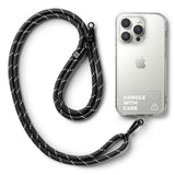 Holder Link Strap | Clear - Three smartphones in clear cases attached to colorful woven lanyards on a light purple background.