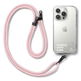 Holder Link Strap | Clear - Three clear phone cases with colorful lanyards attached to black mounting tabs on a purple background.