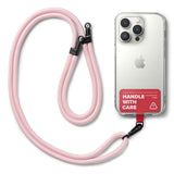 Holder Link Strap | Tarpaulin Red - Pink rope lanyard attached to a clear phone case with a red Handle With Care tab.