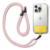 Holder Link Strap | Tarpaulin Yellow - Pink braided phone lanyard attached to a clear phone case with a yellow tag.