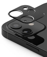 iPhone 12 | Camera Styling - A black protective camera lens cover hovering above the dual-lens array of a black iPhone 12.