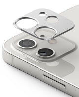 iPhone 12 | Camera Styling - Silver metallic camera lens protector hovering above the dual-lens array of a white iPhone 12.