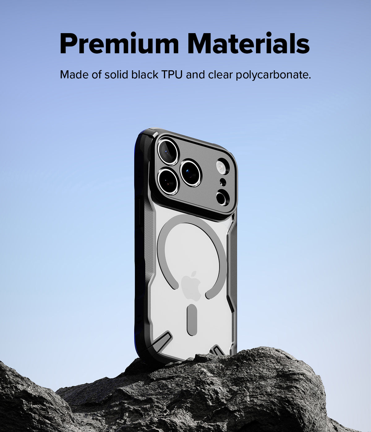 iPhone 18 Pro Case | Fusion-X Magnetic - A black and clear protective phone case stands upright on dark rocks against a light blue sky, with text at the top reading 'Premium Materials' and 'Made of solid black TPU and clear polycarbonate.' The Apple logo is visible through the case, but Apple is not the product brand, so visible_brands is empty.