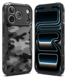 iPhone 18 Pro Case | Fusion-X - Two views of a rugged black phone case on a white background. The left case shows a gray and black camouflage pattern on the back, and the right case shows a dark interior with glowing blue light accents.