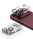 iPhone 18 Pro Max Camera Protector | Camera Full Cover Tempered Glass (2 Pack) - Ringke camera full cover tempered glass protector set shown on a smartphone with multiple circular lens protectors applied, alongside the product packaging box.