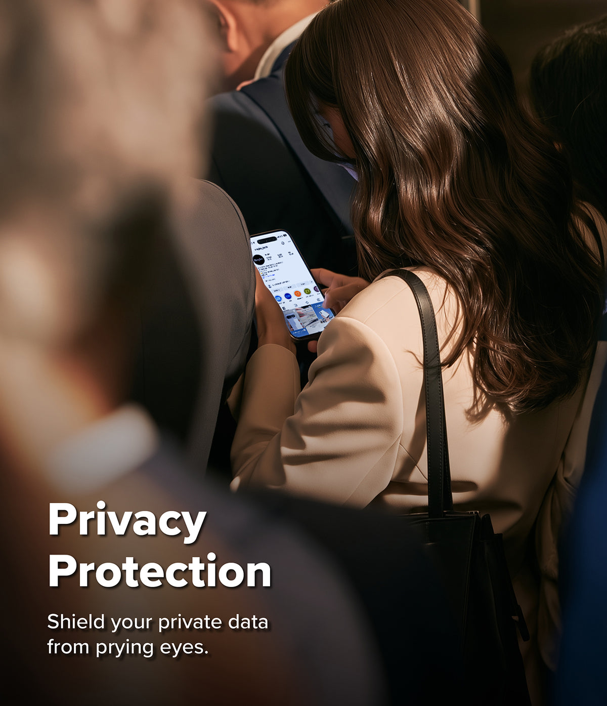 iPhone 18 Pro Max Screen Protector | Easy Slide Privacy Tempered Glass (2 Pack) - A woman in a beige blazer looks down at a smartphone held in her hands while seated in a crowded indoor setting. Large overlaid text reads 'Privacy Protection' with the subtitle 'Shield your private data from prying eyes.