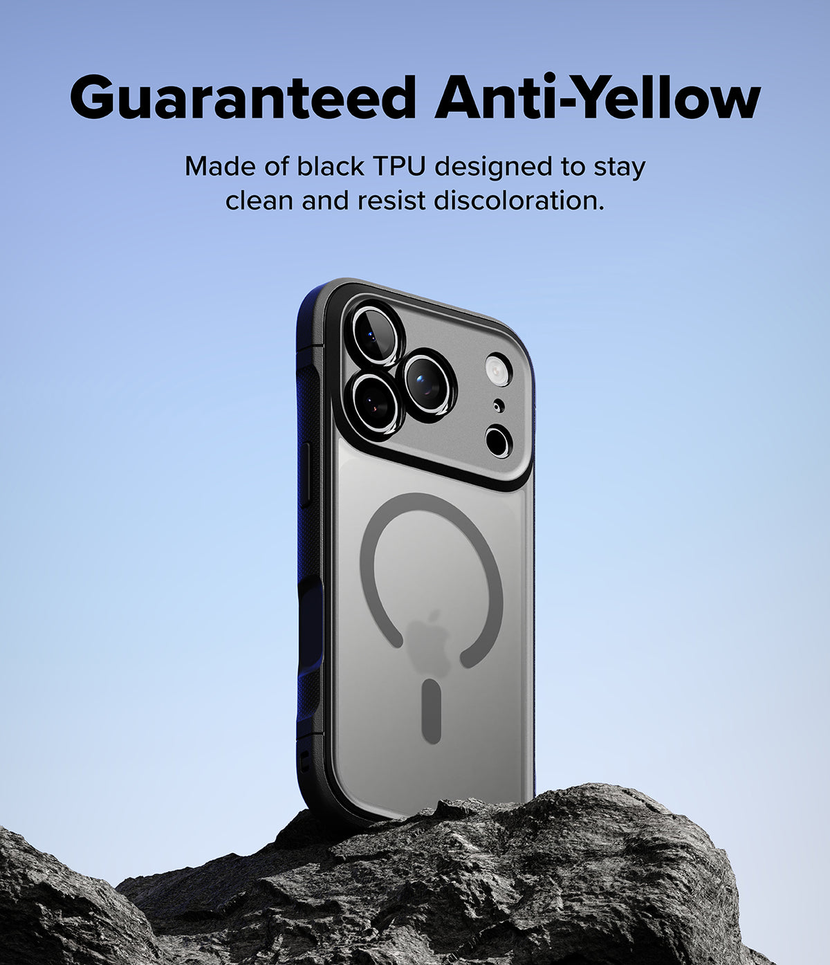 iPhone 18 Pro Max Case | Fusion Bold Magnetic Matte - A black TPU phone case with a MagSafe-compatible ring design, shown on a smartphone standing on dark rocks against a blue sky. Text at the top reads 'Guaranteed Anti-Yellow' and 'Made of black TPU designed to stay clean and resist discoloration.