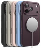 iPhone 18 Pro Max Case | Silicone Magnetic - Five smartphone cases in different colors are shown in a row, with a dark plum case in front featuring a large silver MagSafe ring and cable. The cases include black, light gray, blush pink, light blue, and dark plum.