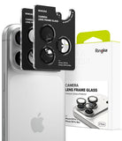 iPhone 18 Pro / 18 Pro Max Camera Protector | Camera Lens Frame Glass (2 Pack) - Ringke camera lens frame glass protector set shown on a silver smartphone, with two black lens protectors attached and the retail box beside them on a white background.
