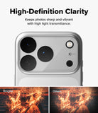 iPhone 18 Pro Camera Protector | Camera Full Cover Tempered Glass (2 Pack) - A close-up of a smartphone camera area on a light gray background with marketing text reading 'High-Definition Clarity' and two small comparison thumbnails at the bottom labeled 'Ringke' and 'Others'. The product appears to be a silver phone or phone case with black camera lenses.