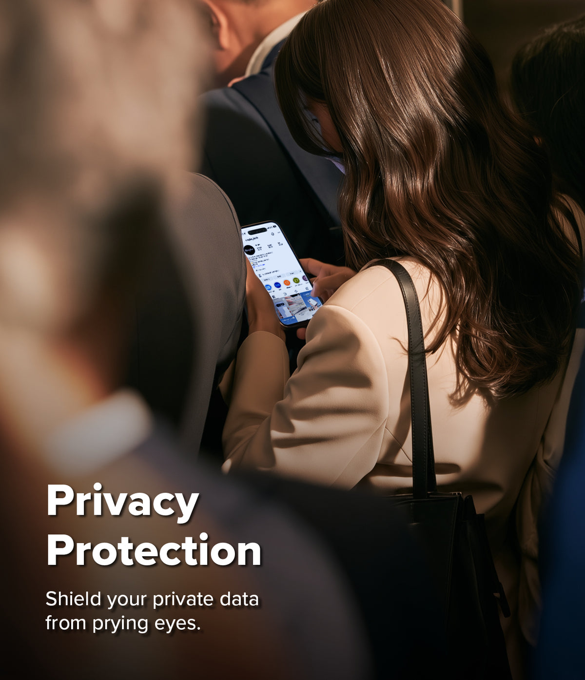 iPhone 18 Pro Screen Protector | Easy Slide Privacy Tempered Glass - A woman in a beige blazer looks down at a smartphone held in her hands while seated in a crowded indoor setting. Large overlaid text reads 'Privacy Protection' with the subtitle 'Shield your private data from prying eyes.