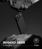 iPhone 18 Pro Case | Rugged Gear - A black and white promotional shot of a Ringke Rugged Gear phone case with a dark camouflage pattern, shown floating between two rocks. Text at the bottom reads 'RUGGED GEAR for iPhone 16 Pro Max' with the Ringke logo.