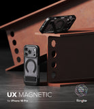 iPhone 18 Pro Case | UX Magnetic - Ringke UX Magnetic case for iPhone 18 Pro, shown in a dark translucent black finish with a magnetic ring strap. The case is displayed in two angles (front and back with stand function) against a stylized background of rusty corrugated steel beams.
