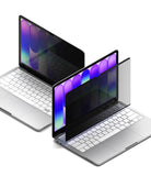 MacBook Neo | Magnetic AG Privacy Film - Two silver laptops with transparent screen protectors shown at an angle on a clean white background.