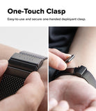 Galaxy Watch Ultra 2 / 1 | Metal One Mesh - Two-panel close-up demonstrating a black metal mesh watch band with a one-touch clasp. The left panel shows the clasp deployed on a wrist, and the right panel shows a hand pressing a button to release the clasp.