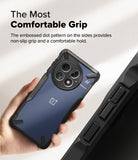 [Bundle] OnePlus 13 | Fusion-X - OnePlus 13 | Fusion-X - Hand holding a blue OnePlus 13 in a black Fusion-X case with textured, non-slip side grips.