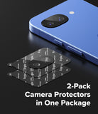 [Bundle] Google Pixel 10a Case | Onyx - Google Pixel 10a Case | Onyx - Two black Ringke camera lens protectors stacked next to a blue smartphone on a black surface.
