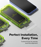 Google Pixel 10a Screen Protector | Easy Slide Tempered Glass - A close-up promotional shot of a transparent neon green phone screen protector tray being used to apply a clear screen protector to a smartphone. A blue smartphone is shown in the background, and bold text reads 'Perfect Installation, Every Time' with smaller descriptive copy below.