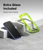 Google Pixel 10a Screen Protector | Easy Slide Tempered Glass - Two replacement phone screen protectors are displayed on a light gray surface with white blocks. One protector is shown in a translucent bright green frame, and the other is shown in a translucent light blue frame, both positioned next to a smartphone with a black screen and blue bumper.