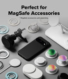 Google Pixel 11 Pro Case | Onyx Magnetic - A black smartphone case with a MagSafe-compatible magnetic ring accessory, shown on a gray surface surrounded by white and colored MagSafe accessories and a white charging stand. Text at the top reads 'Perfect for MagSafe Accessories' with smaller text noting MagSafe accessories are sold separately.