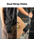 Google Pixel 11 Case | Onyx Magnetic - A split-panel product demonstration showing a black phone case with dual strap attachment points. The left panel shows the case hanging from a shoulder strap on a person's waist, and the right panel shows the case hanging from a blue wrist strap on a person's leg while holding a ladder.