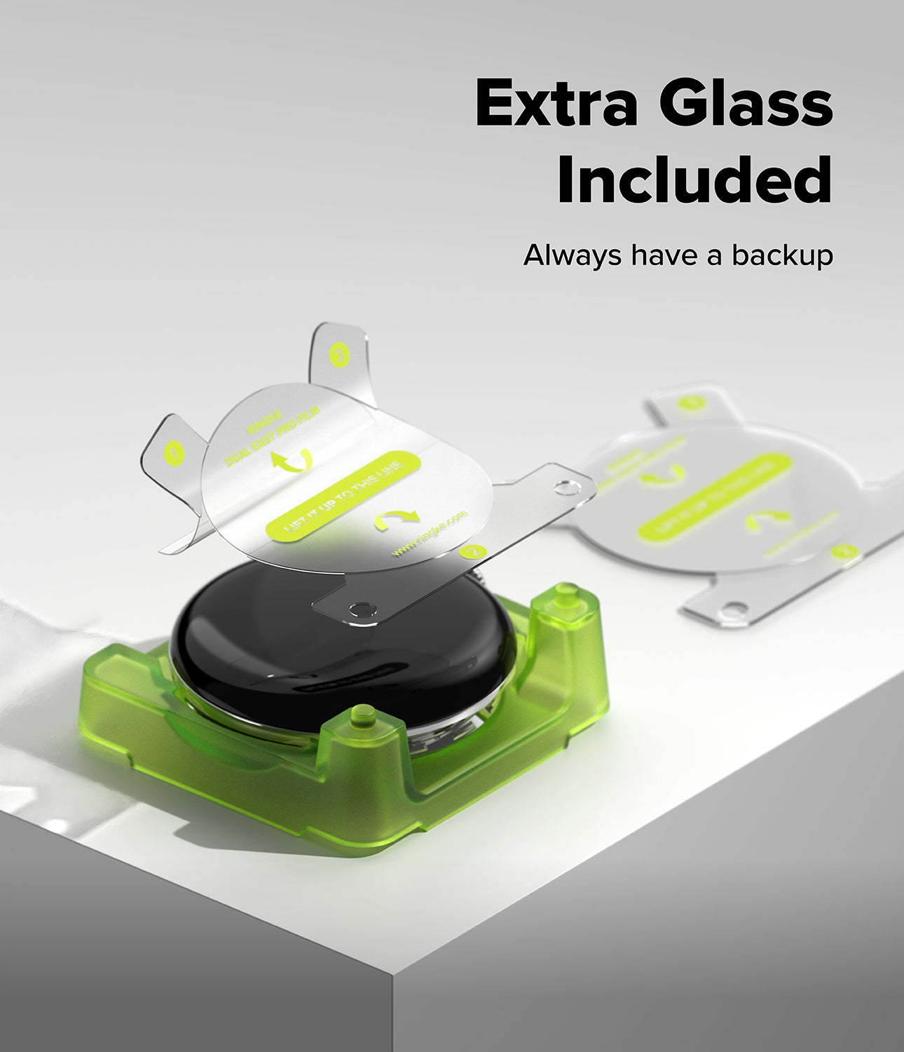 Pixel Watch 5 / 4 41mm Screen Protector | Dual Easy Film Pro (2P) - A product display showing a black circular item in a translucent lime green holder, with two clear glass replacement pieces floating above and to the right. Large text reads 'Extra Glass Included' and 'Always have a backup' on a clean light gray background.