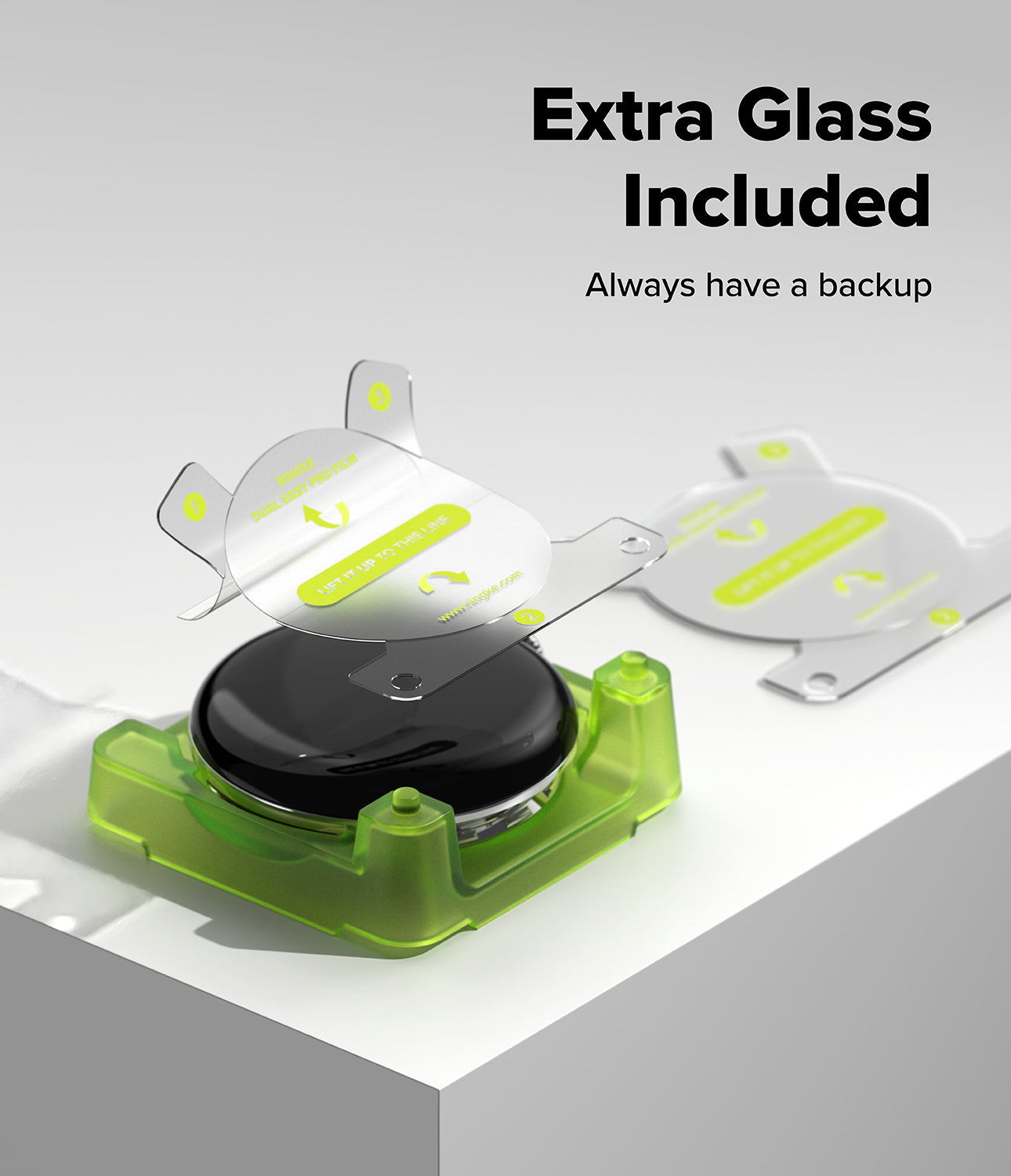 Pixel Watch 5 / 4 45mm Screen Protector | Dual Easy Film Pro (2P) - A replacement face shield or protective face cover shown open, with a clear glass panel and printed green/yellow insert visible, placed on a white surface. Text on the image reads 'Extra Glass Included' and 'Always have a backup.