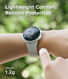 Pixel Watch 5 / 4 41mm | Slim (2P) - A smartwatch with a light gray band worn on a person's wrist, with a finger touching the side of the watch. The background is a blurred green outdoor setting, and text overlays read 'Lightweight Comfort, Reliable Protection' and 'Weight 1.