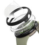 Pixel Watch 5 / 4 41mm | Case + Screen (2P) - A smartwatch shown with multiple transparent protective accessories layered around it, including a clear screen protector, a black band, a clear case, and a green-and-black interior detail, on a white background.