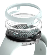 Pixel Watch 5 / 4 41mm | Slim (2P) - A smartwatch with a pale mint green band and black case, shown with a transparent protective bumper and a matching pale mint green ring accessory against a white background.