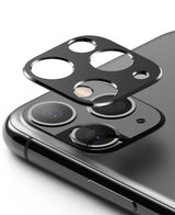 iPhone 11 Pro / Pro Max | Camera Styling - A black protective camera lens cover hovering above an iPhone 11 Pro camera array.