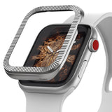 Apple Watch Series 3 / 2 / 1 (38mm) | Premium Bezel Styling O - Silver ribbed bezel accessory hovering over watch face.
