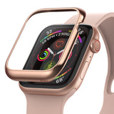 Apple Watch Series 6 / 5 / 4 / SE (40mm) | Bezel Styling - Rose gold metal bezel cover hovering over an Apple Watch.