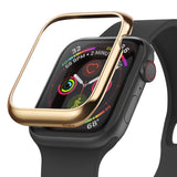 Apple Watch Series 6 / 5 / 4 / SE (40mm) | Bezel Styling - Gold metal bezel accessory hovering above a black Apple Watch.