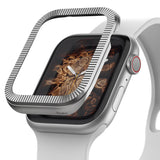 Apple Watch Series 6 / 5 / 4 / SE (44mm) | Premium Bezel Styling O - Silver ribbed bezel accessory hovering over an Apple Watch.