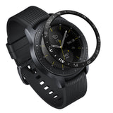 Galaxy Watch (42mm) | Bezel Styling - A black smartwatch with a floating, matching metallic bezel ring hovering above the watch face.