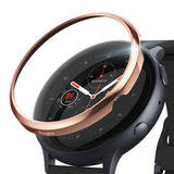 Galaxy Watch Active 2 (44mm) | Bezel Styling - Rose gold metal bezel ring hovering above a black smartwatch face.