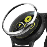 Galaxy Watch Active | Bezel Styling - A silver metal bezel accessory hovering above a black Galaxy Watch Active.