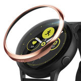 Galaxy Watch Active | Bezel Styling - Rose gold metal bezel ring hovering above a black Galaxy Watch Active face.