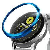 Galaxy Watch Active | Bezel Styling - A metallic blue bezel ring hovering above a silver Galaxy Watch Active.