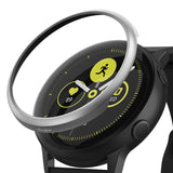 Galaxy Watch Active | Bezel Styling - Silver metallic bezel ring hovering above a black Galaxy Watch Active face.