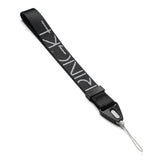 Hand Strap | Lettering - Black fabric wrist strap with white Ringke branding and a thin loop attachment on a white background.
