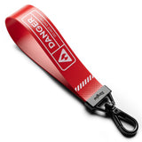 Key Ring Strap | Danger - Red Danger-themed fabric strap with a black carabiner attached to a clear AirPods case on a desk.