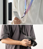 Design Lanyard Strap - A person wearing a blue-pink lanyard with a phone and another wearing a black lanyard with a camera.