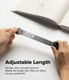 Design Shoulder Strap - A person wearing a gray lanyard attached to a phone case with a single loop connector.